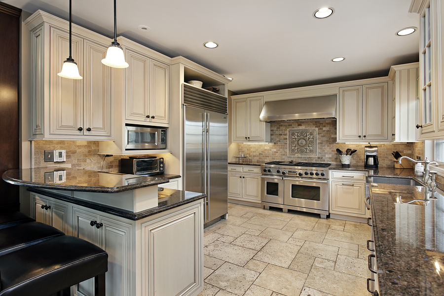 Photo of modern kitchen with marble and stone.